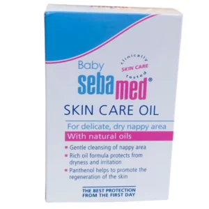 Front view of Sebamed Baby Skin Care Oil packaging box, highlighting its rich natural oil formula, soothing Panthenol properties, and application for delicate, dry nappy areas.