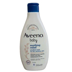 Front view of an Aveeno Baby Soothing Relief Emollient Wash 250ml bottle, highlighting its formulation with natural oat oil and vitamin E for dry, sensitive skin.