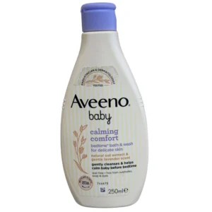 Front view of an Aveeno Baby Calming Comfort Bedtime Bath & Wash 250ml bottle, highlighting its natural oat extract and gentle lavender scent formula with a purple flip-top cap.