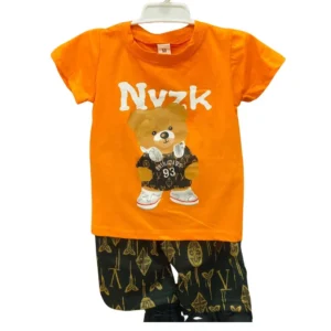 A 2-piece set for boys featuring a bright orange t-shirt with a teddy bear graphic and black shorts with a gold geometric pattern.