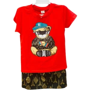 A 2-piece set for boys consisting of a red t-shirt with a graphic of a bear in a cap and sunglasses, paired with black shorts featuring a gold geometric pattern.