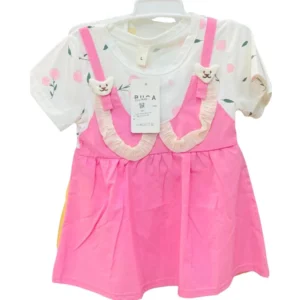 A girls' L-size dress set featuring a white top with a floral print layered under a pink pinafore-style dress with cat-face accents and ruffle trim.
